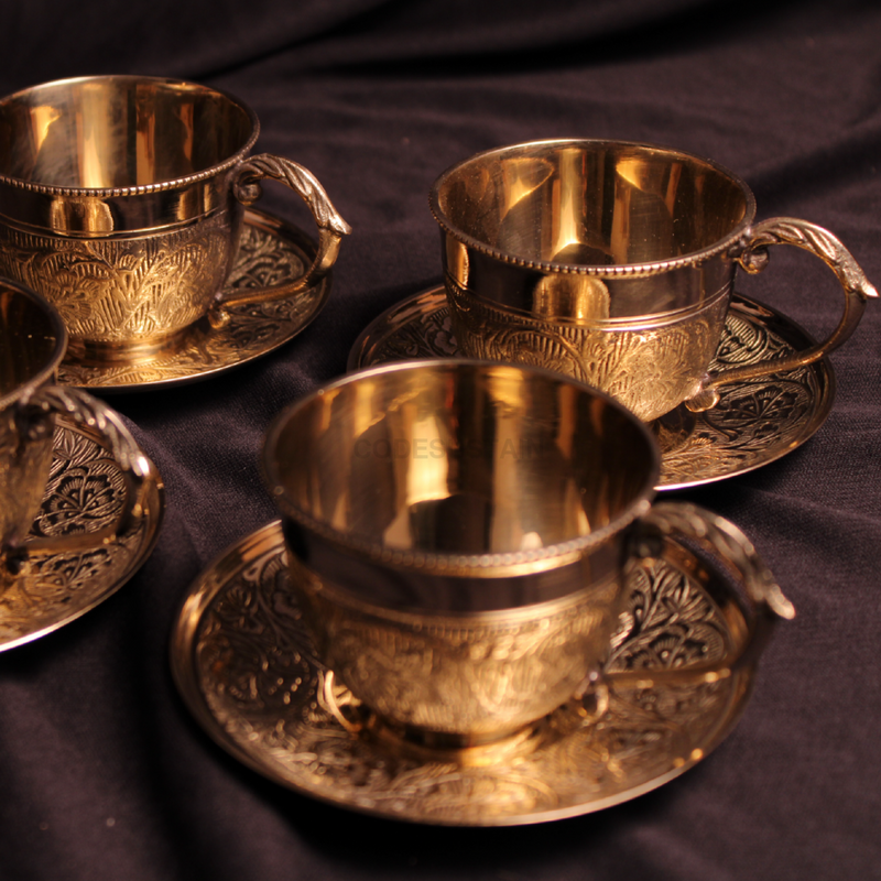This Indian metal brass tea cup set brings a royal feel to the way