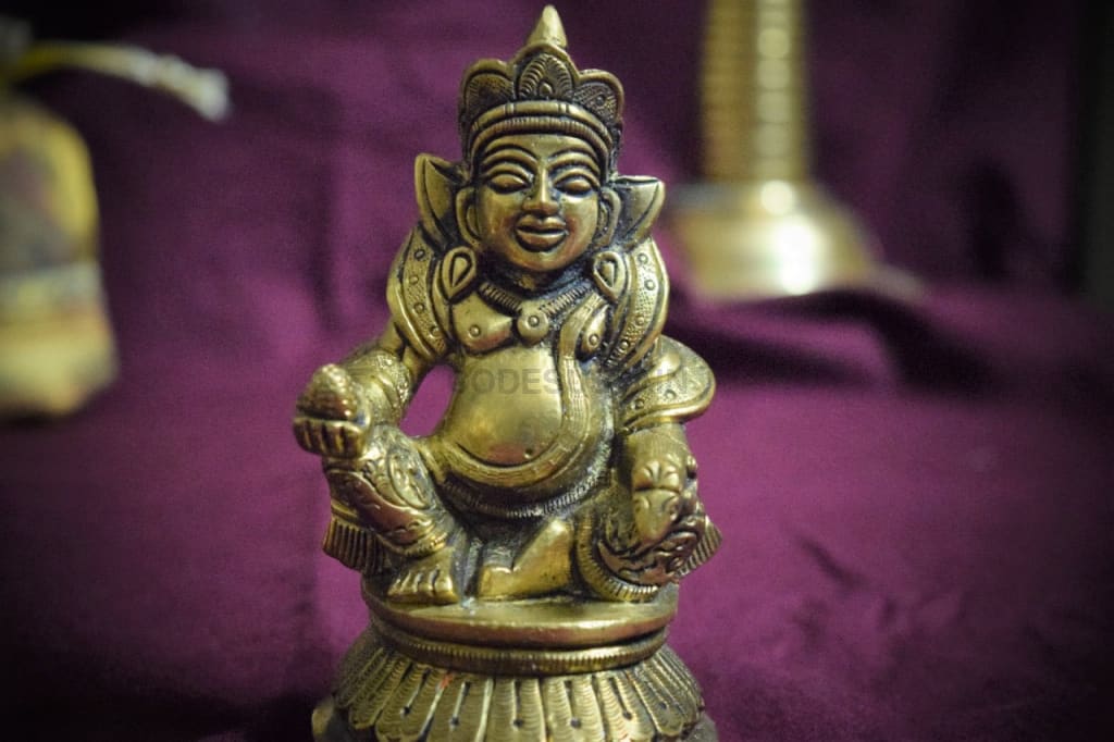 Yamas Lord Kuber Idol with Dhan Potli - Codesustain