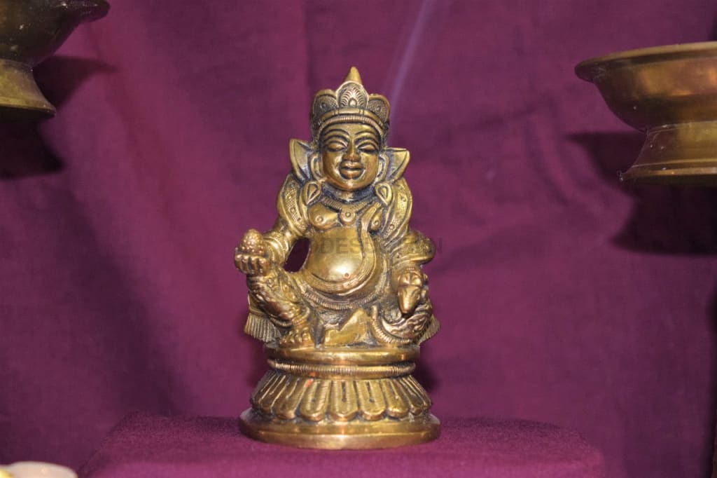 Yamas Lord Kuber Idol with Dhan Potli - Codesustain